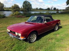 Louer une PEUGEOT 504 Cabriolet de de 1969 (Photo 1)